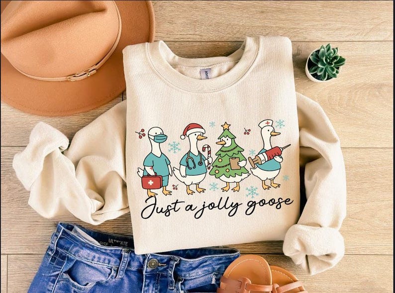 Christmas Goose Nurse Sweatshirt, Just A Jolly Goose Nurse  Sweater, Cute Winter T-Shirt Nursing Student Gift, Medical Team Xmas Shirt