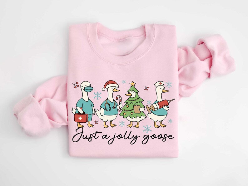 Christmas Goose Nurse Sweatshirt, Just A Jolly Goose Nurse  Sweater, Cute Winter T-Shirt Nursing Student Gift, Medical Team Xmas Shirt