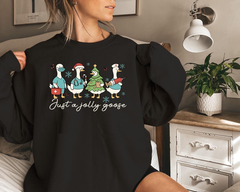 Christmas Goose Nurse Sweatshirt, Just A Jolly Goose Nurse  Sweater, Cute Winter T-Shirt Nursing Student Gift, Medical Team Xmas Shirt