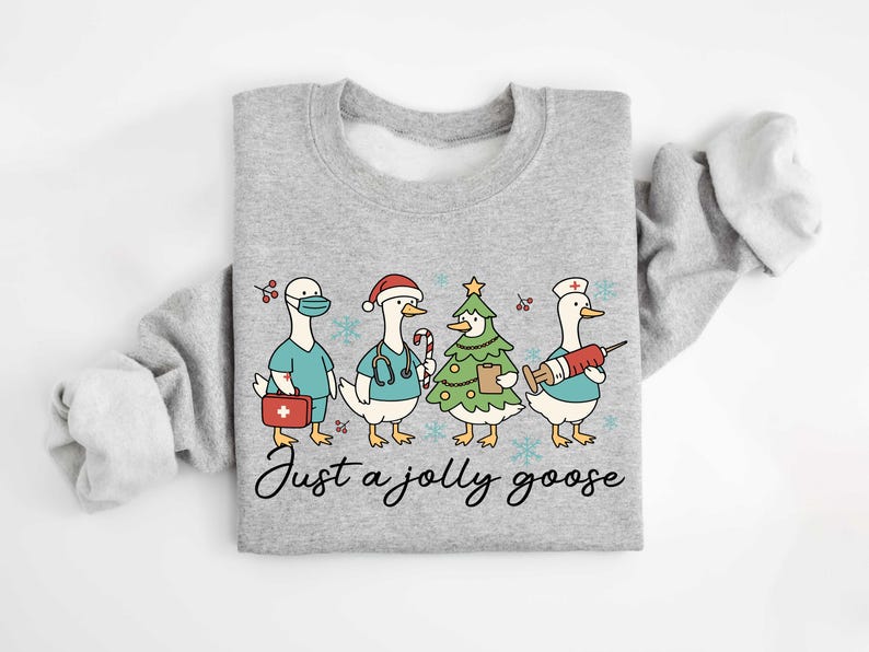 Christmas Goose Nurse Sweatshirt, Just A Jolly Goose Nurse  Sweater, Cute Winter T-Shirt Nursing Student Gift, Medical Team Xmas Shirt