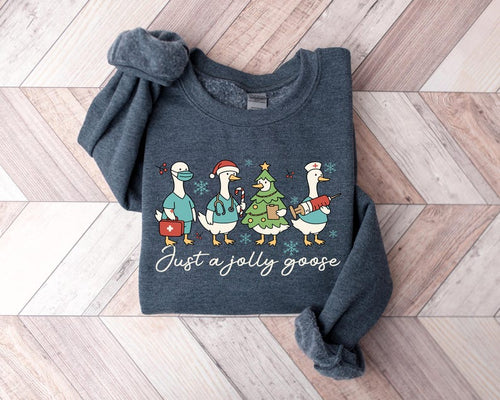 Christmas Goose Nurse Sweatshirt, Just A Jolly Goose Nurse  Sweater, Cute Winter T-Shirt Nursing Student Gift, Medical Team Xmas Shirt